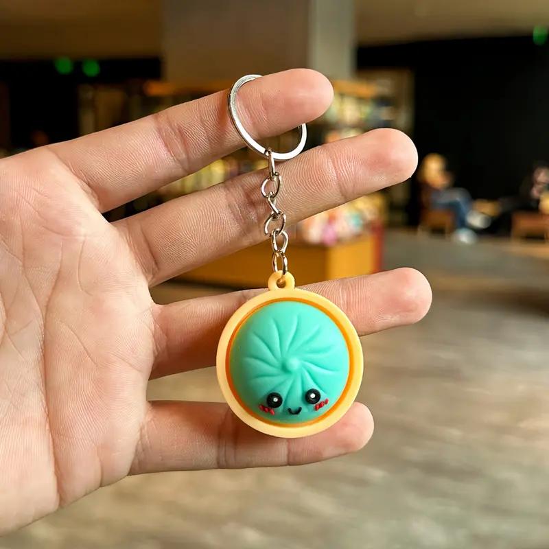 Light-Up Cute Dumpling Pressable Fidget Keychain - PVC Food‑Shaped Charm, Wear‑Resistant Stress Relief Toy for Daily Use, Party & Gifting