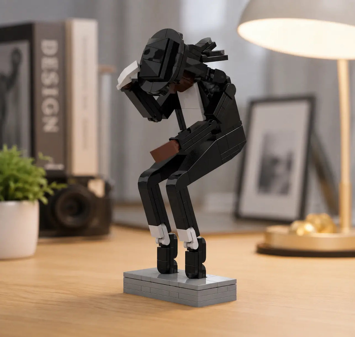 Classic dance pose building block figure displayed on a desk