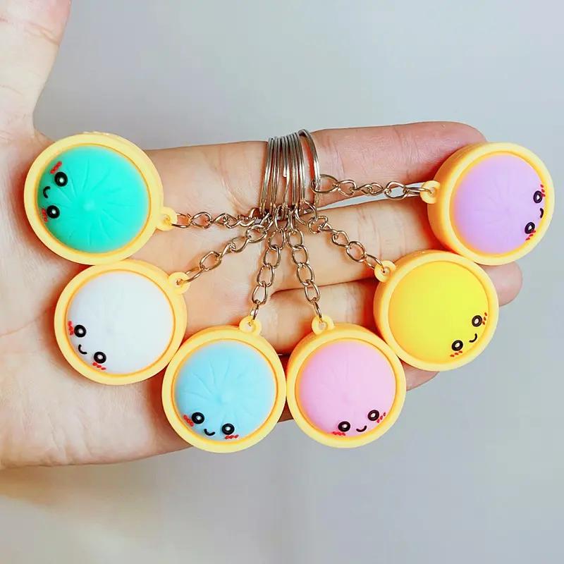 Light-Up Cute Dumpling Pressable Fidget Keychain - PVC Food‑Shaped Charm, Wear‑Resistant Stress Relief Toy for Daily Use, Party & Gifting