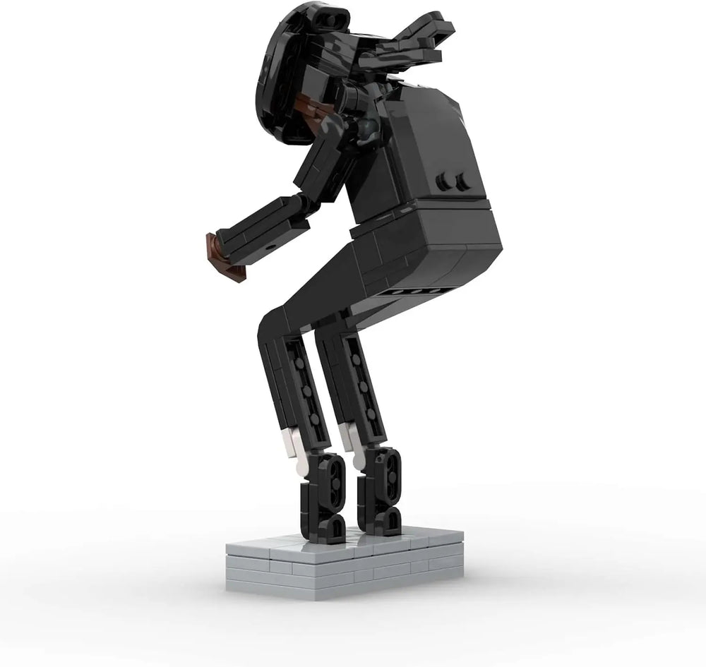 Rear view of classic dance pose building block figure