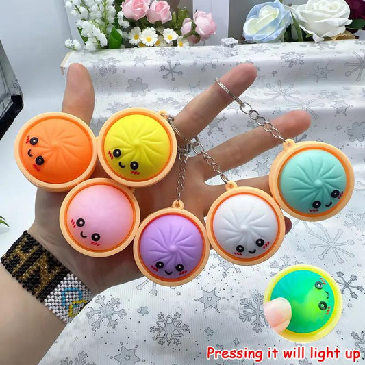 Light-Up Cute Dumpling Pressable Fidget Keychain - PVC Food‑Shaped Charm, Wear‑Resistant Stress Relief Toy for Daily Use, Party & Gifting